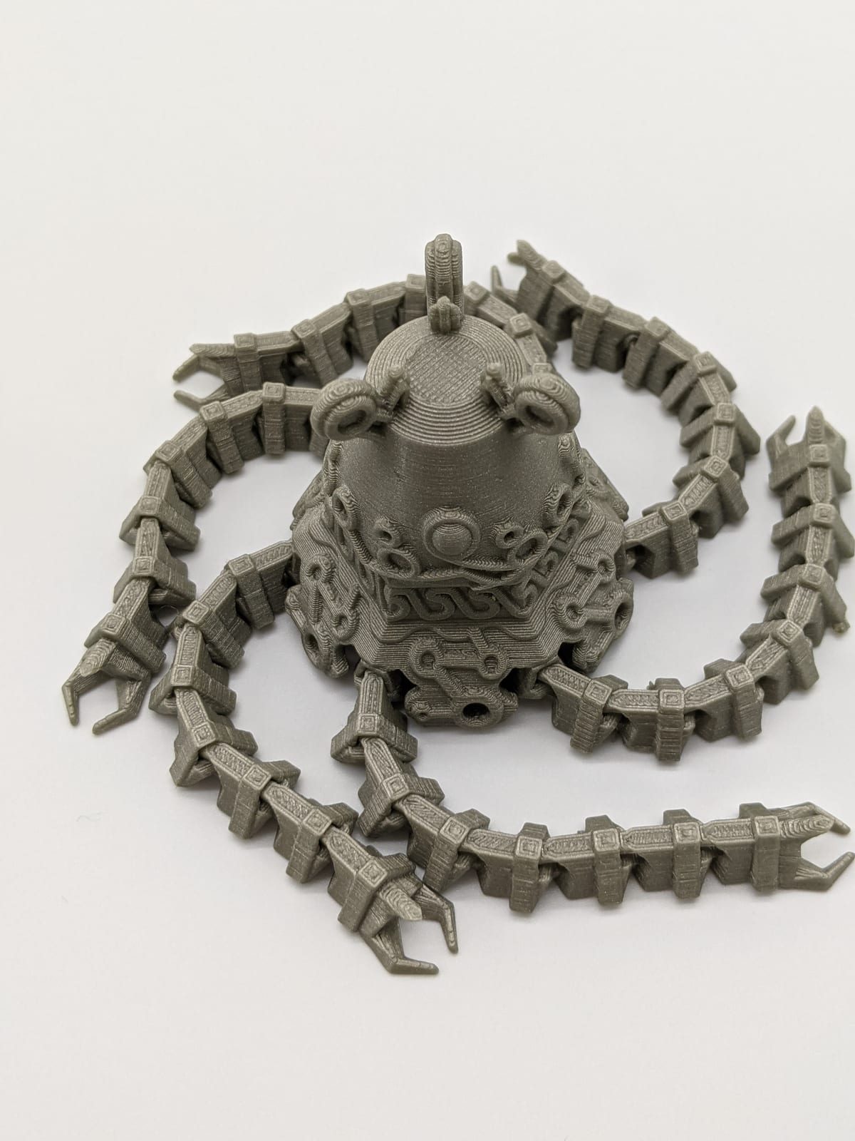 Gray print-in-place articulated kraken with eight poseable arms